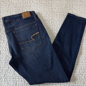 AE Super Stretch X4 Waist 32-34 x 27